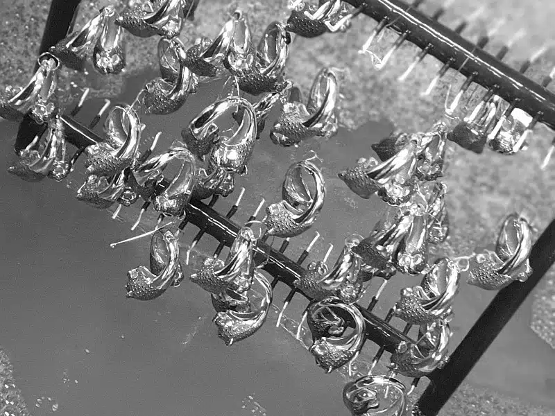 Gold and rhodium plating process on jewelry pieces