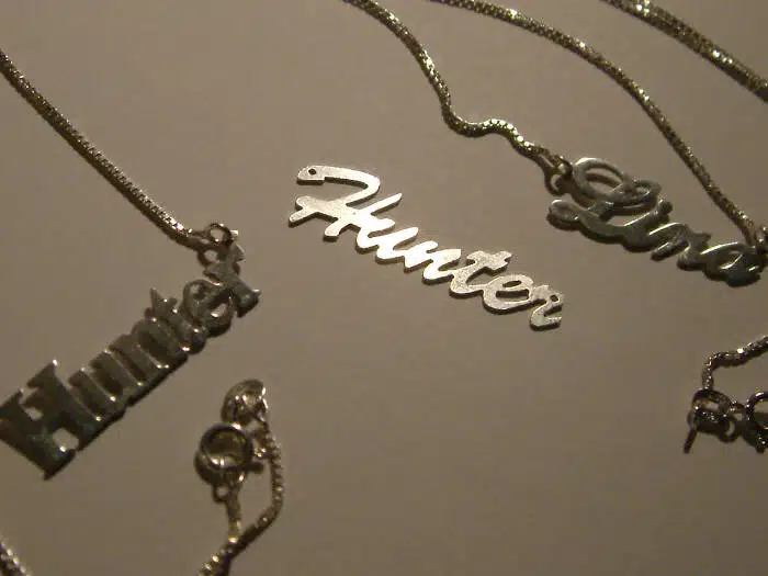 Laser-cut personalized name and lettering on jewelry