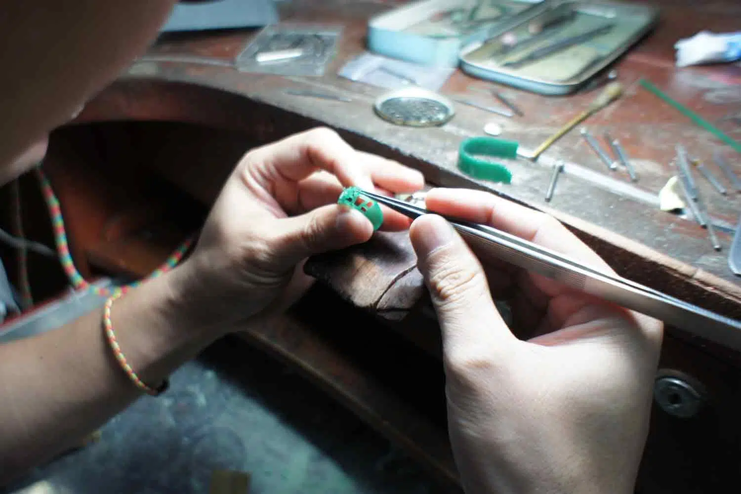 Traditional hand wax carving by skilled jewelry artisan